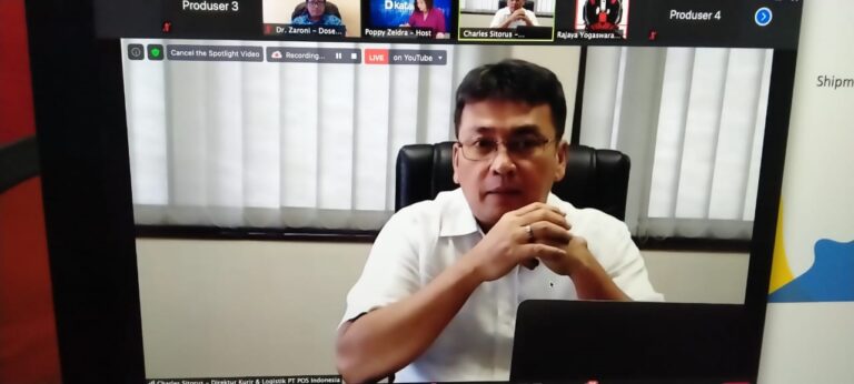 Direktur Komersial PT POS Indonesia Charles Sitorus