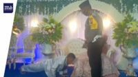 Tak Pakai Masker, Pengantin Pria Dihukum Push Up di Diatas Pelaminan