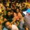 Buruh migran Indonesia menunggu petugas imigrasi Malaysia memeriksa status imigrasi mereka di luar Kuala Lumpur