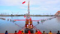 Bendera 1.000 Meter Di Bentangkan, Simbol Semangat Pemkot Makassar Atasi Covid-19