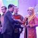 Diskominfo Makassar Raih Penghargaan Peduli Media di SMSI Award Sulsel 2024