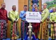 HUT Pangkep Ke-64: Pj Gubernur Sulsel Serahkan Bantuan, Resmikan Proyek Pembangunan