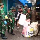 Koramil 1408-08 Makassar Karya Bhakti Bersihkan Pasar Kerung-kerung