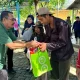 Sekolah Islam Athirah Bukit Baruga Bagikan 1147 Paket Sembako ke Duafa