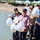 Danny Pomanto Lepas Puluhan Ribu Benih Ikan Air Tawar di Waduk Nipa-Nipa