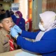 PDGI Bone dan Pepsodent Edukasi & Pemeriksaan Gigi Gratis di Ponpes Al Ikhlas Ujung Bone