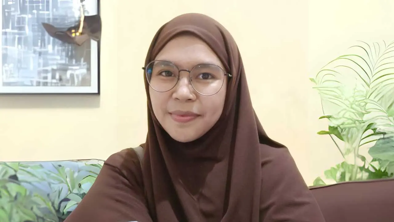 Vindy W. Maramis, S.S (Penulis)