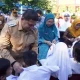Pemkot Makassar Salurkan Seragam Gratis, Wali Kota dan TP PKK Dampingi Langsung Siswa Baru