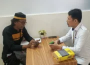 Ishak Hamzah dan Humas PN Makassar Wahyudi Said SH., MH (kemeja putih)