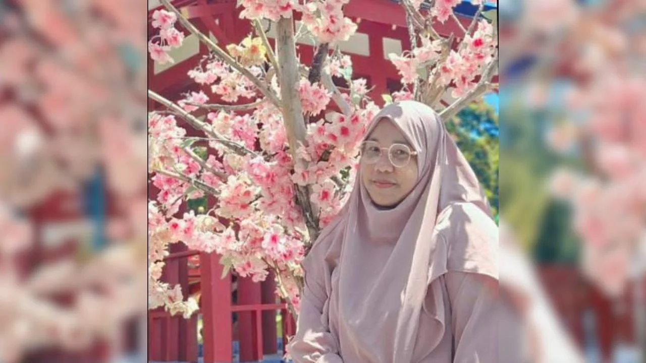 Mansyuriah, S.S. (Aktivis Muslimah)