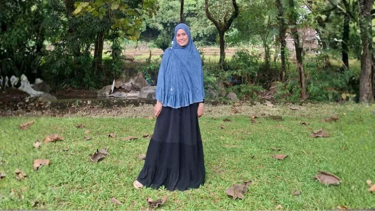 Sri Rahmayani, S.Kom (Aktivis Muslimah)