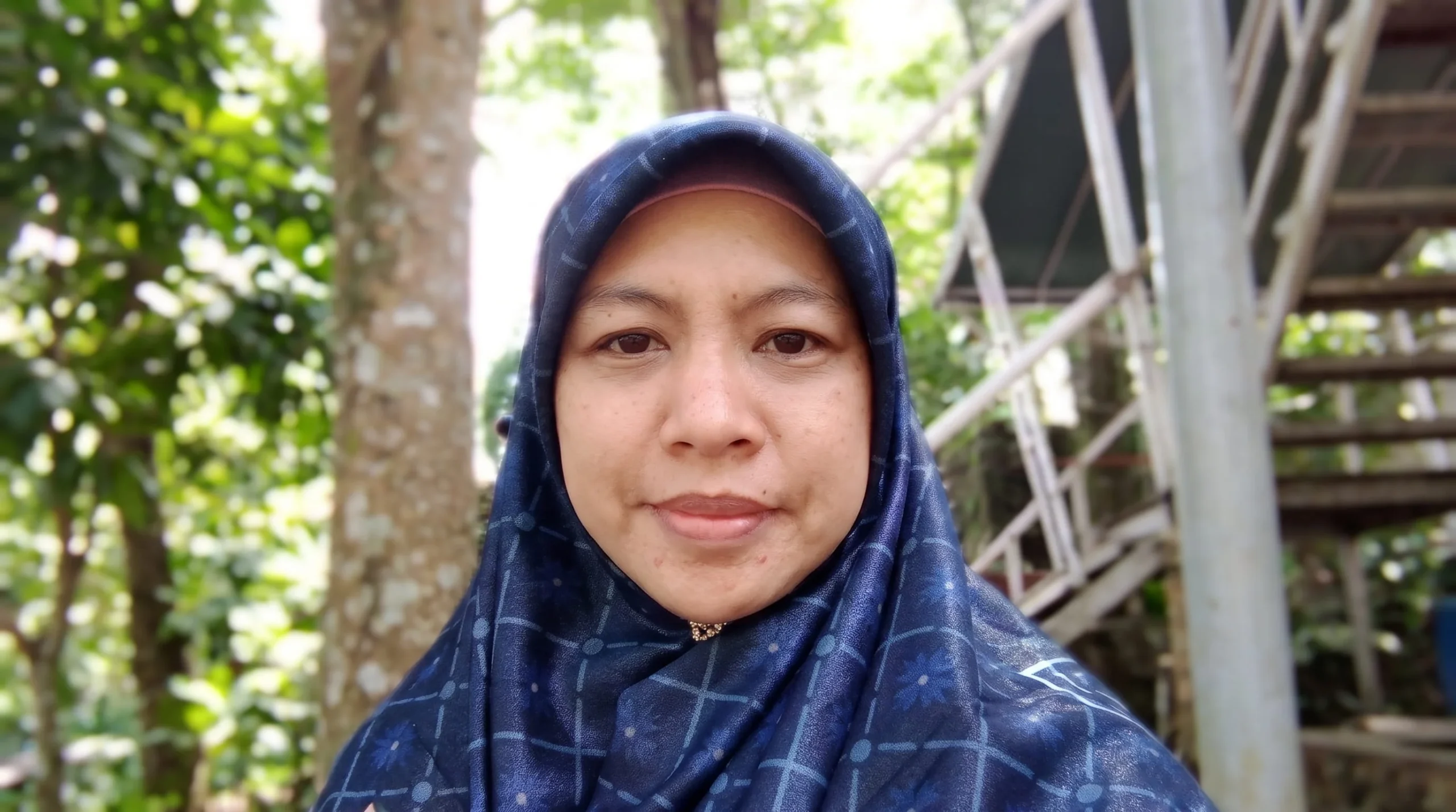 Nazli M. Agustina Nst, S.PdI