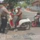 Polisi Jenponto bagi masker